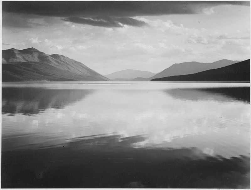 Looking_across_lake_toward_mountains,_-Evening,_McDonald_Lake,_Glacier_National_Park,-_Montana.,_1933_-_1942_-_NARA_-_519861